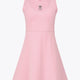 Osaka women floucy dress pink with logo in grey. Front flatlay view