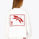 Woman wearing the Osaka women v-neck cropped sweater white with logo in red. Back view