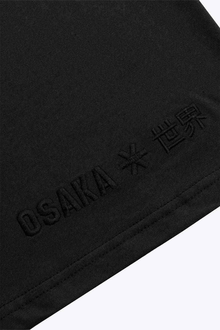 Osaka unisex basic tee in black. Detail logo view