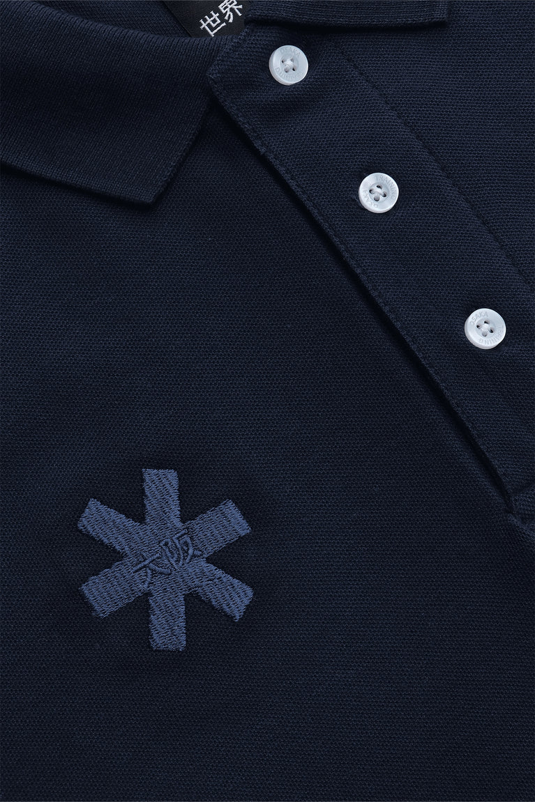 Osaka unisex basic polo in navy with navy logo. Front detail logo view