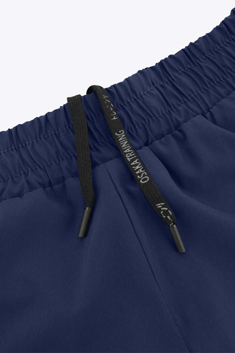 Navy women’s court short with elastic waistband and black drawstring ends