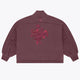 Women’s mockneck sweater back view in dark plum with red floral graphic