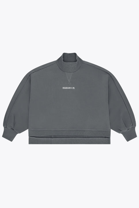 Dark grey melange women’s mockneck sweater with ribbed hem and cuffs.