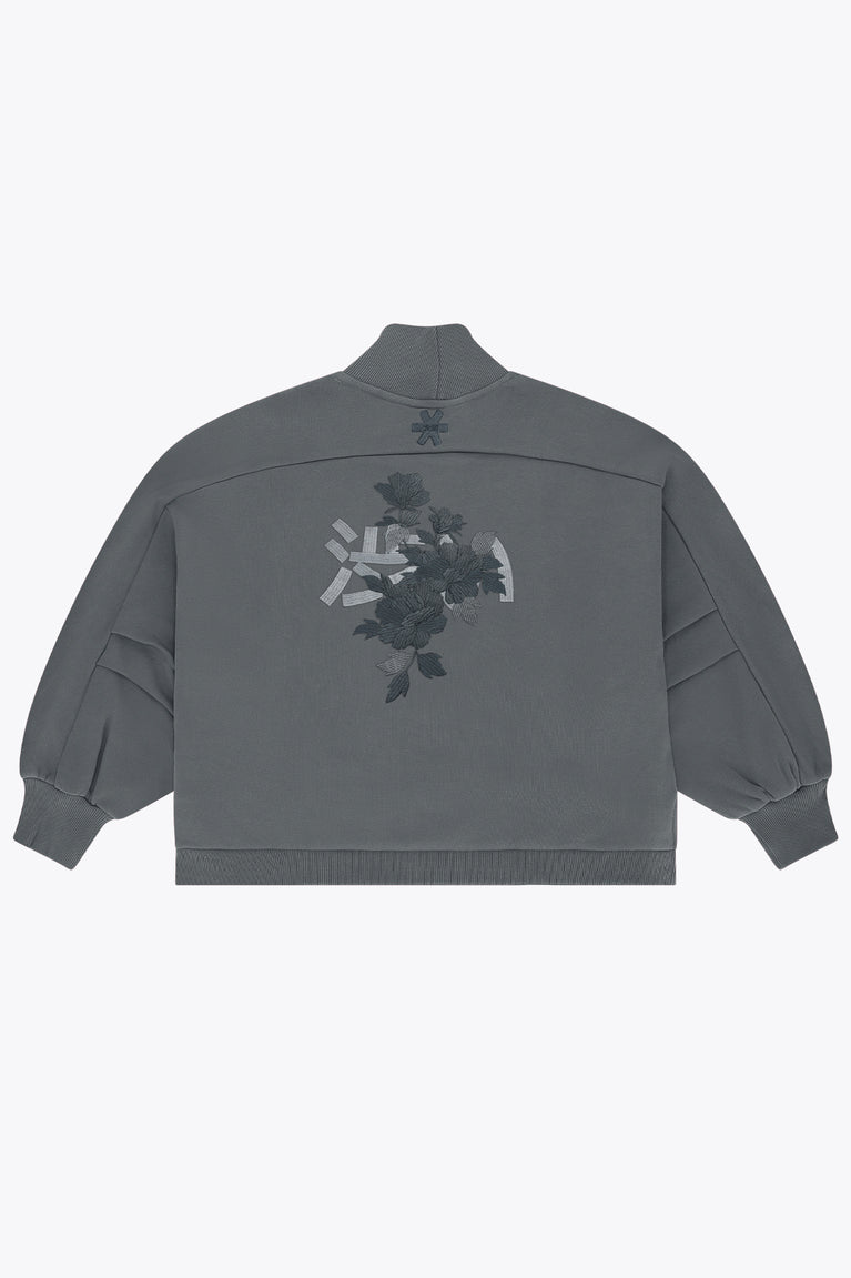 Dark grey melange women’s mockneck sweater with floral back graphic and ribbed cuffs.