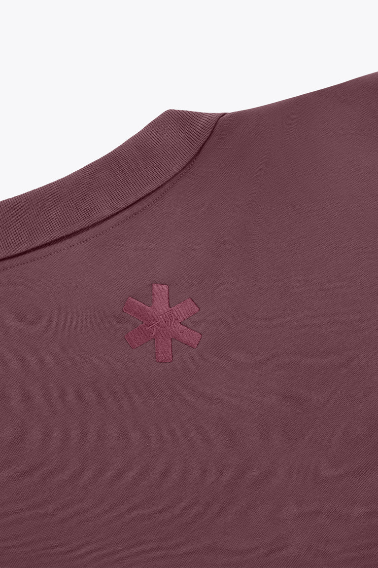 Women’s Osaka polo zip sweater back close-up with cross/star embroidery on chest