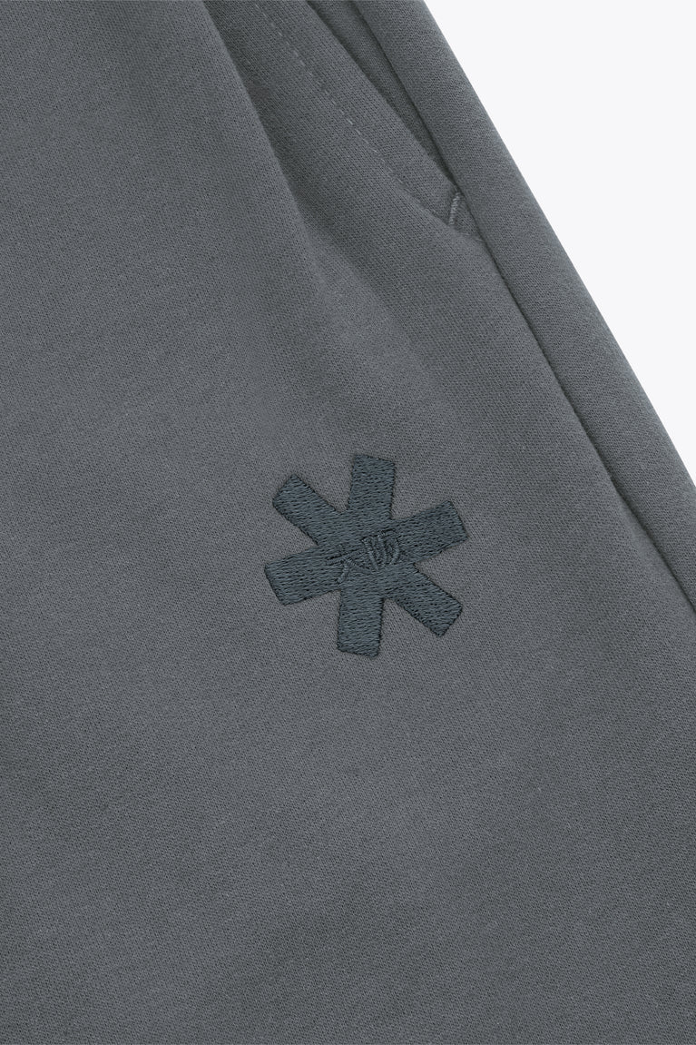 Dark grey melange sweatpants with small starburst logo on front