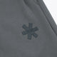 Dark grey melange sweatpants with small starburst logo on front