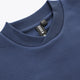 Dark blue Osaka sweater neckline with ribbed collar and inner label tag