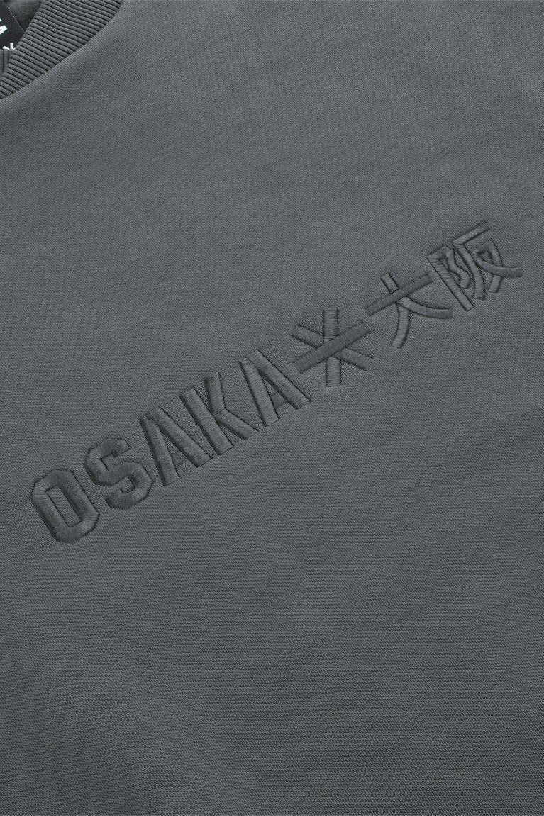 Dark grey melange sweater with embossed Osaka front logo detail