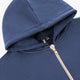 Men's hooded full-zip hoodie close-up, dark blue hood and gold zipper teeth