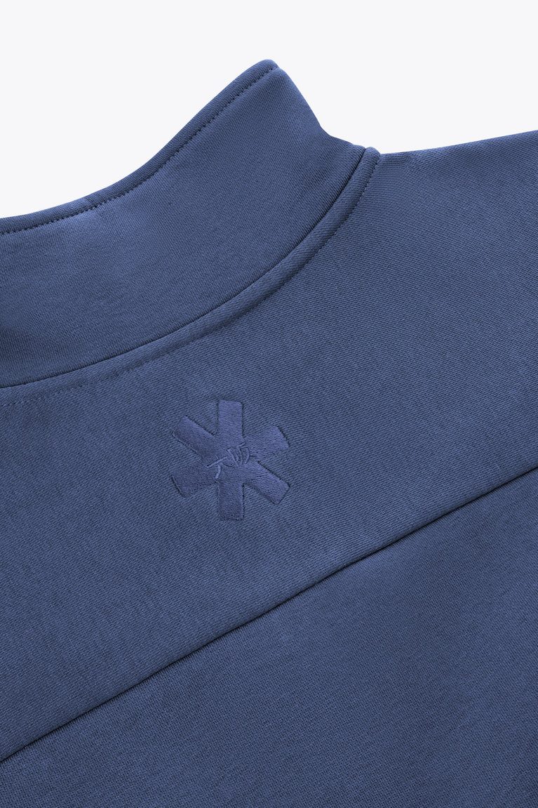Men's navy half-zip sweater with embroidered logo at the stand collar.