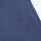Blue sweatpants with small embroidered snowflake detail on the leg