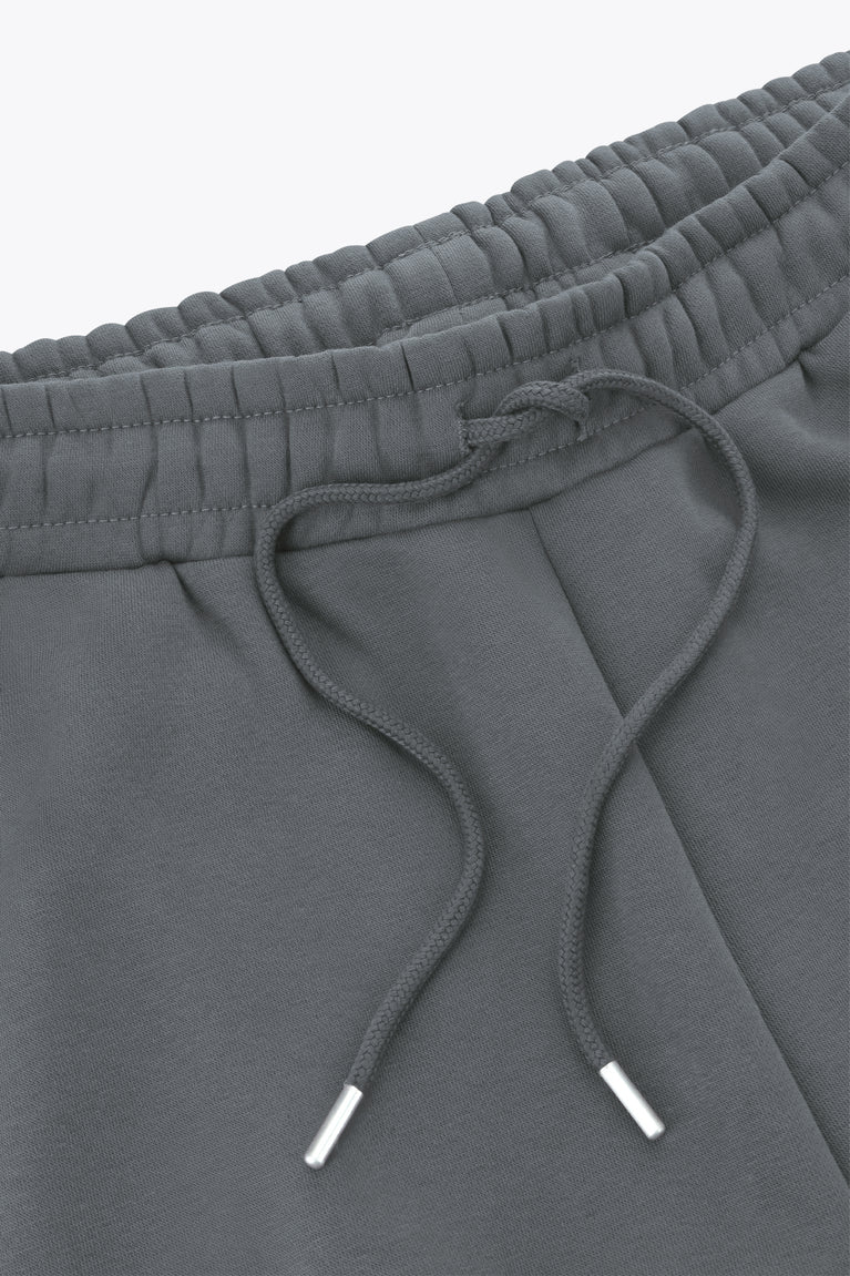 Dark grey melange elastic waistband with adjustable drawstring cords.