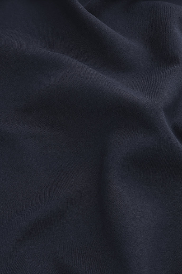 Navy unisex knit hoodie fabric close-up