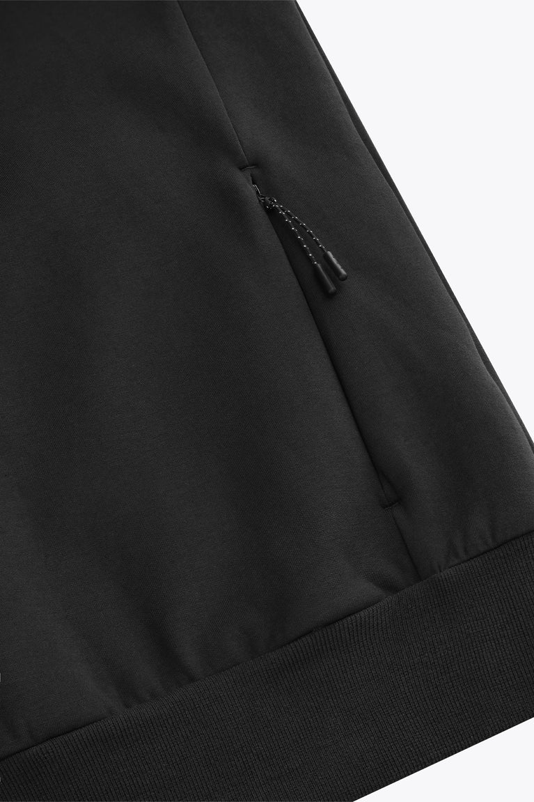 Black unisex hoodie sleeve and ribbed hem cuff with subtle stitching.