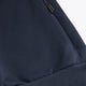 Navy knit sweater sleeve with small metal zipper accent and ribbed cuff