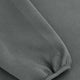 Unisex sweater sleeve cuff close-up in dark grey melange with ribbed knit