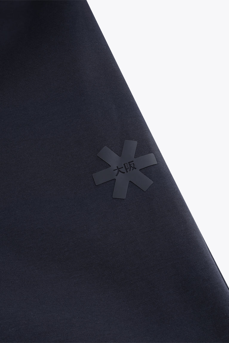 Navy sweatpants with Osaka logo graphic detail on the leg
