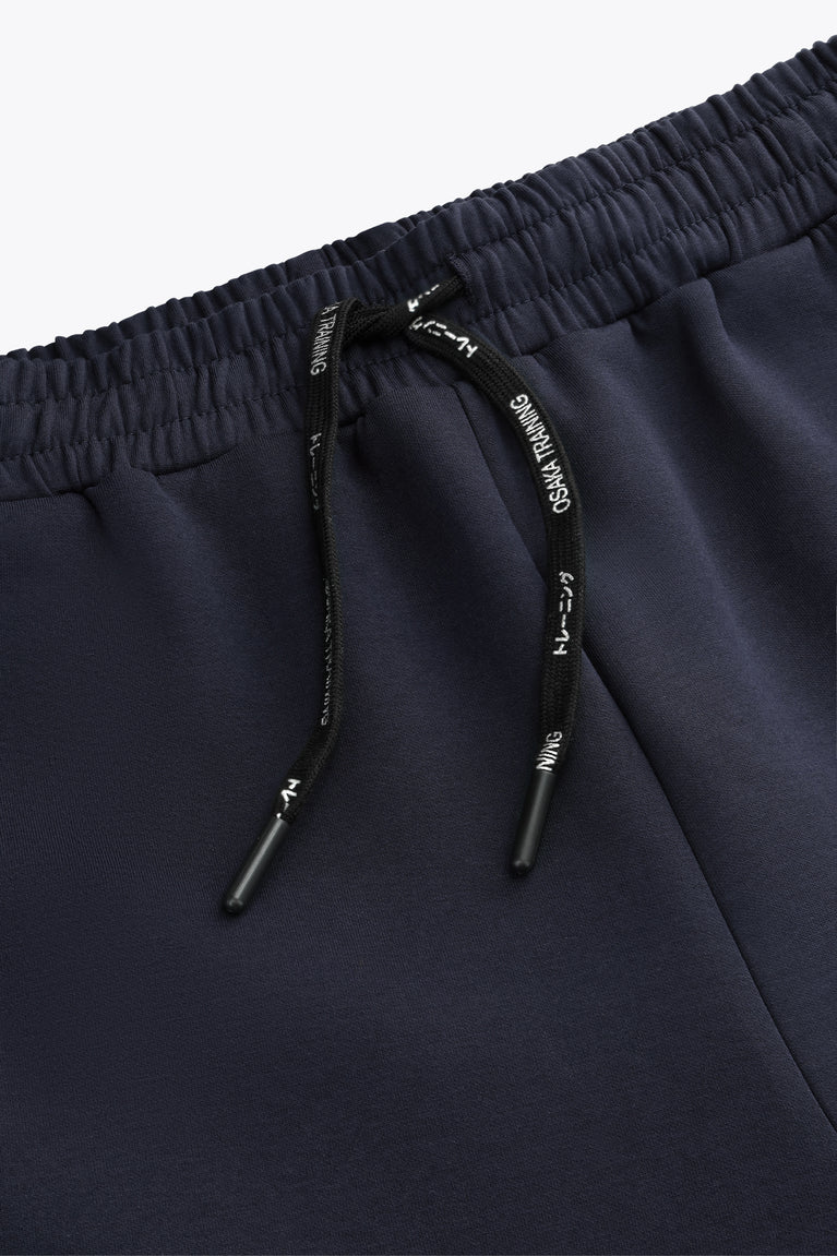 Navy sweatpants waistband with drawstring and stitched inner pocket panel