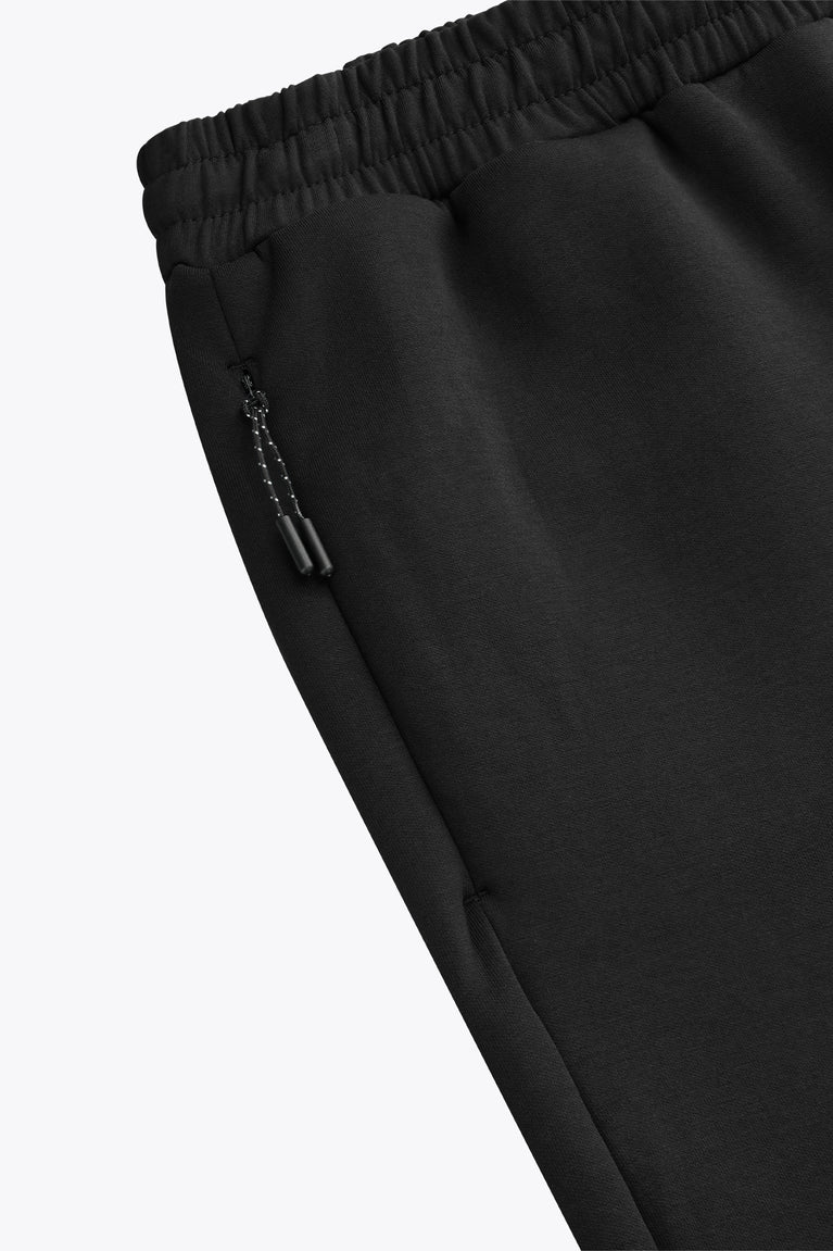Black sweatpants with side seam pocket detail and drawstring end
