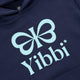 Kids deep sea navy hoodie close-up of mint Yibbi text and bow graphic.