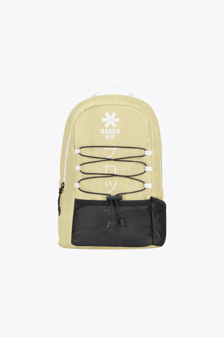 Osaka pro tour backpack in faded yellow with logo in white. Front view
