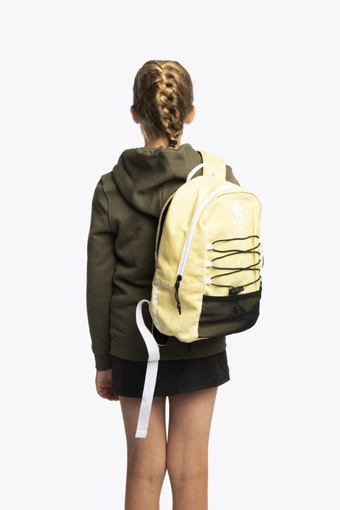 Osaka pro tour backpack in faded yellow with logo in white. Front view