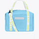 Osaka neoprene duffel bag in light blue with logo in white on the bag and in green on the straps. Front view