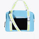 Osaka neoprene duffel bag in light blue with logo in white on the bag and in green on the straps. Back view