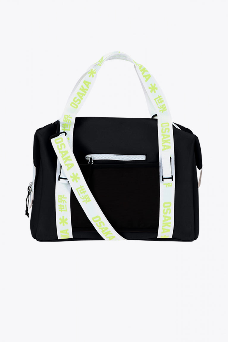 Osaka neoprene duffel bag in black with logo in white on the bag and in green on the straps. Back view