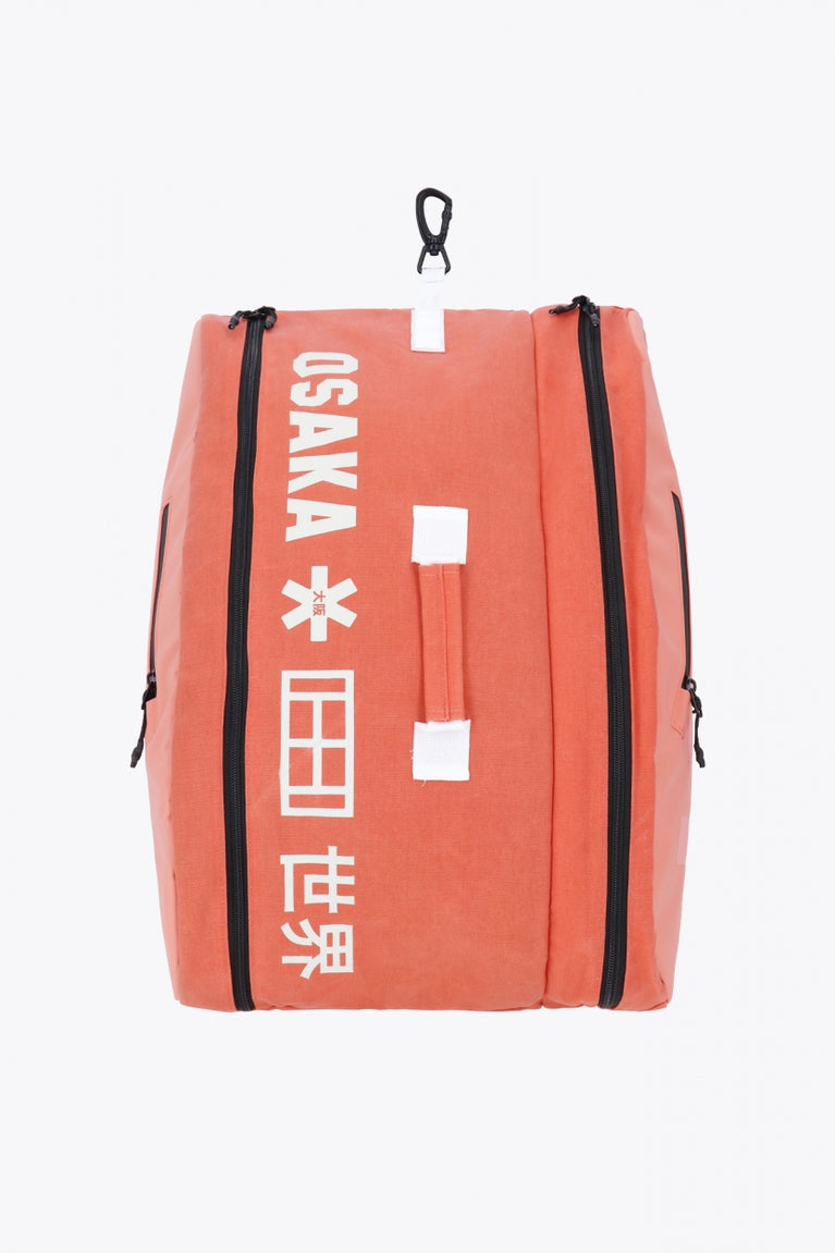 Pro Tour padel bag in peach with logo in white. Front view