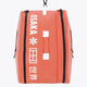 Pro Tour padel bag in peach with logo in white. Front view