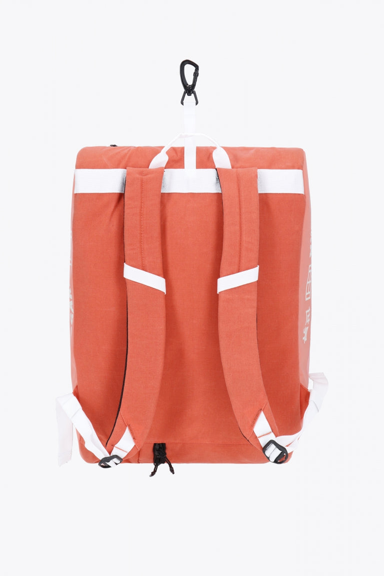 Pro Tour padel bag in peach with logo in white. Back view