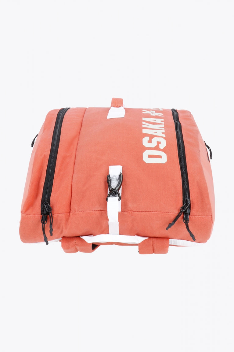 Pro Tour padel bag in peach with logo in white. From above view
