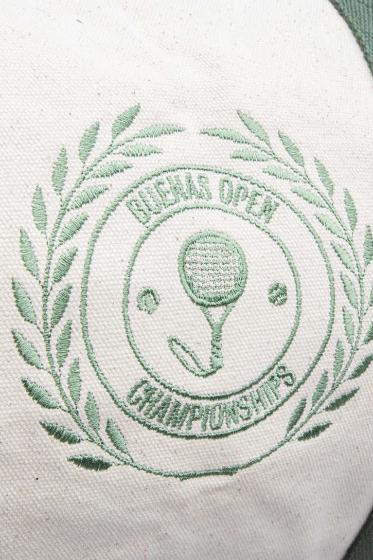Osaka X Buenas Open duffel bag in cream with logo in green. Detail logo view