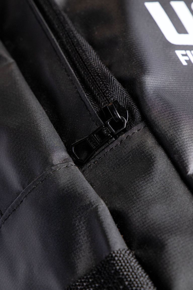 Osaka x Nexus backpack medium in black with white Osaka and Nexus logo on it. Detail zip view