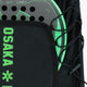 Osaka vision padel backpack in black with logo in green. Detail racket view