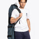 Osaka Hockey Stickbag Pro Tour large in Navy with logo in black. Model wearing view