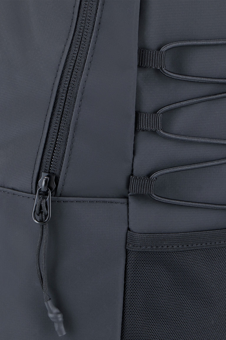 Osaka pro tour backpack compact in black with logo in green. Detail zip view