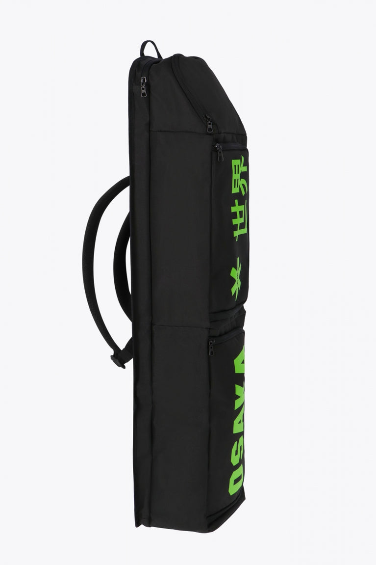 Osaka sports stickbag large in black with logo in green. Side view