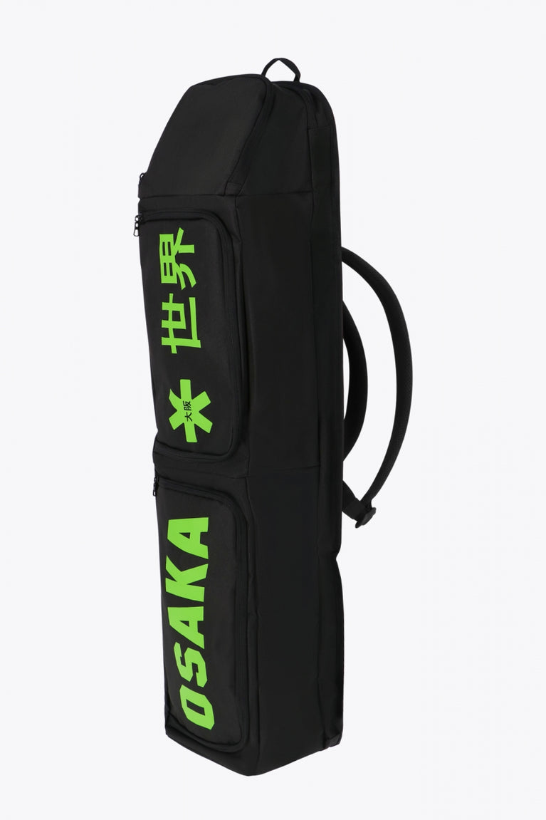 Osaka sports stickbag large in black with logo in green. Side view
