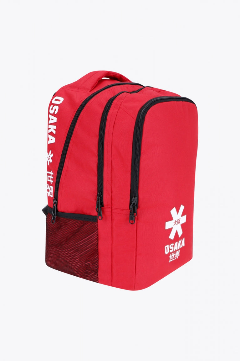 Osaka sports backpack in red with logo in white. Side view