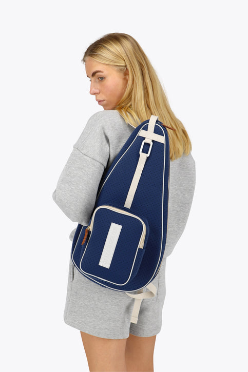 Osaka neoprene padel bag in navy with structure and logo in white. Front view