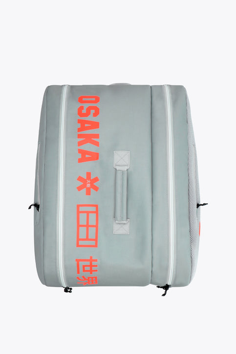 Osaka sports padel bag medium in grey with logo in orange. Front view
