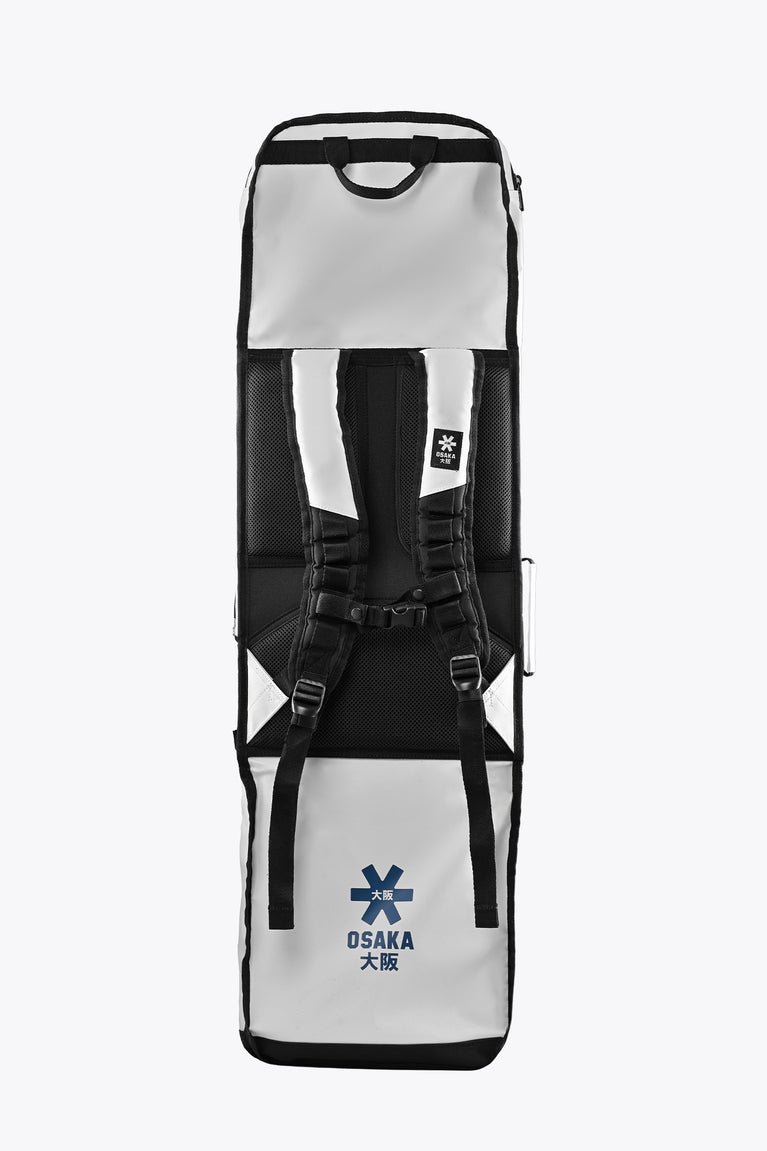 Modular ice hockey stickbag with two front compartments; white and black color-block design.