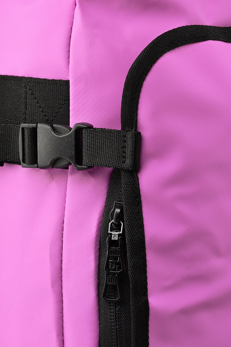 Black strap and buckle detail on rose bud stickbag with stitched attachment tab