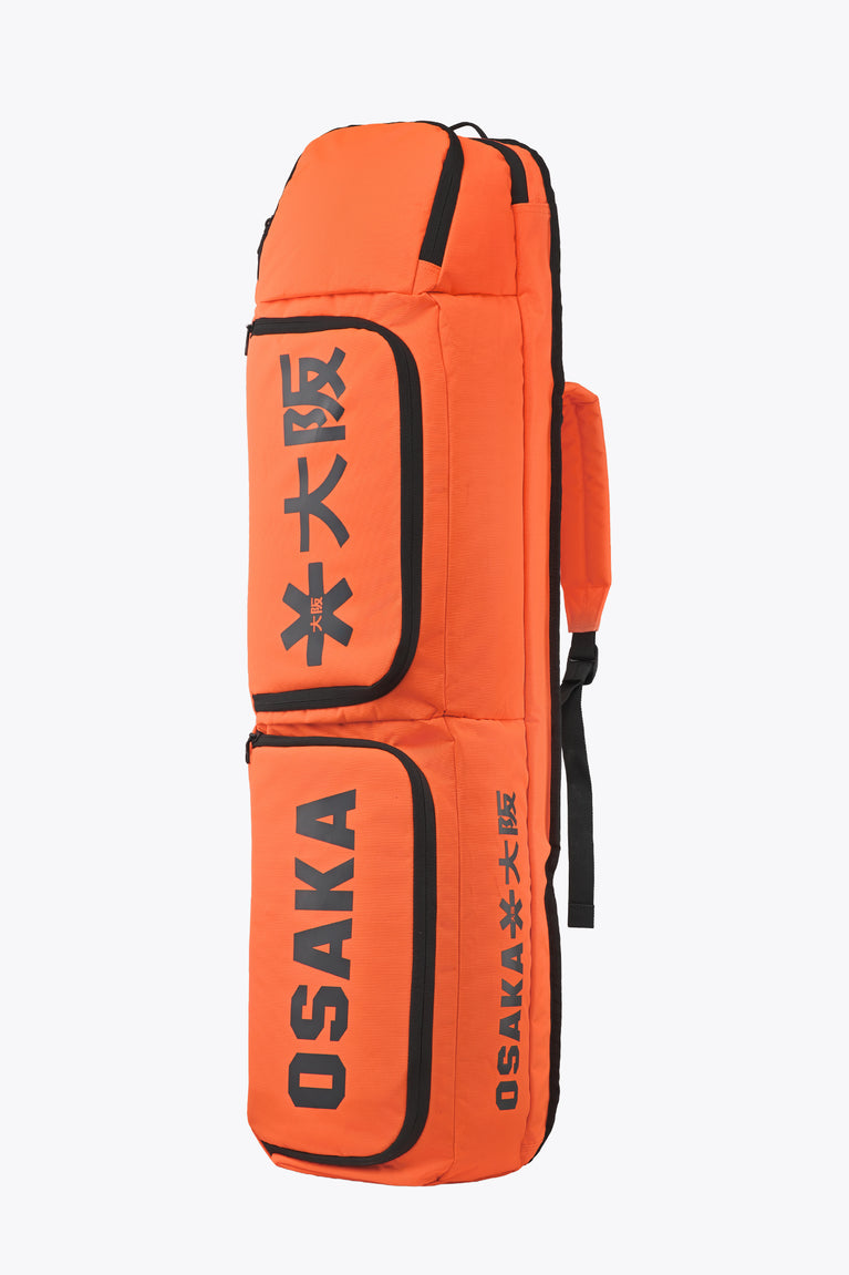 Orange large stickbag with black trim, two compartments, and Osaka logo