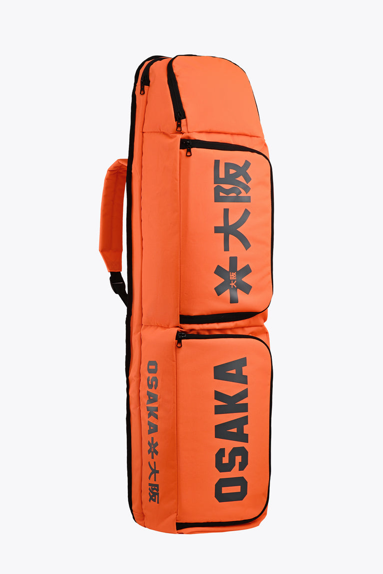 Orange large stickbag with dual compartments and black carry handle/strap