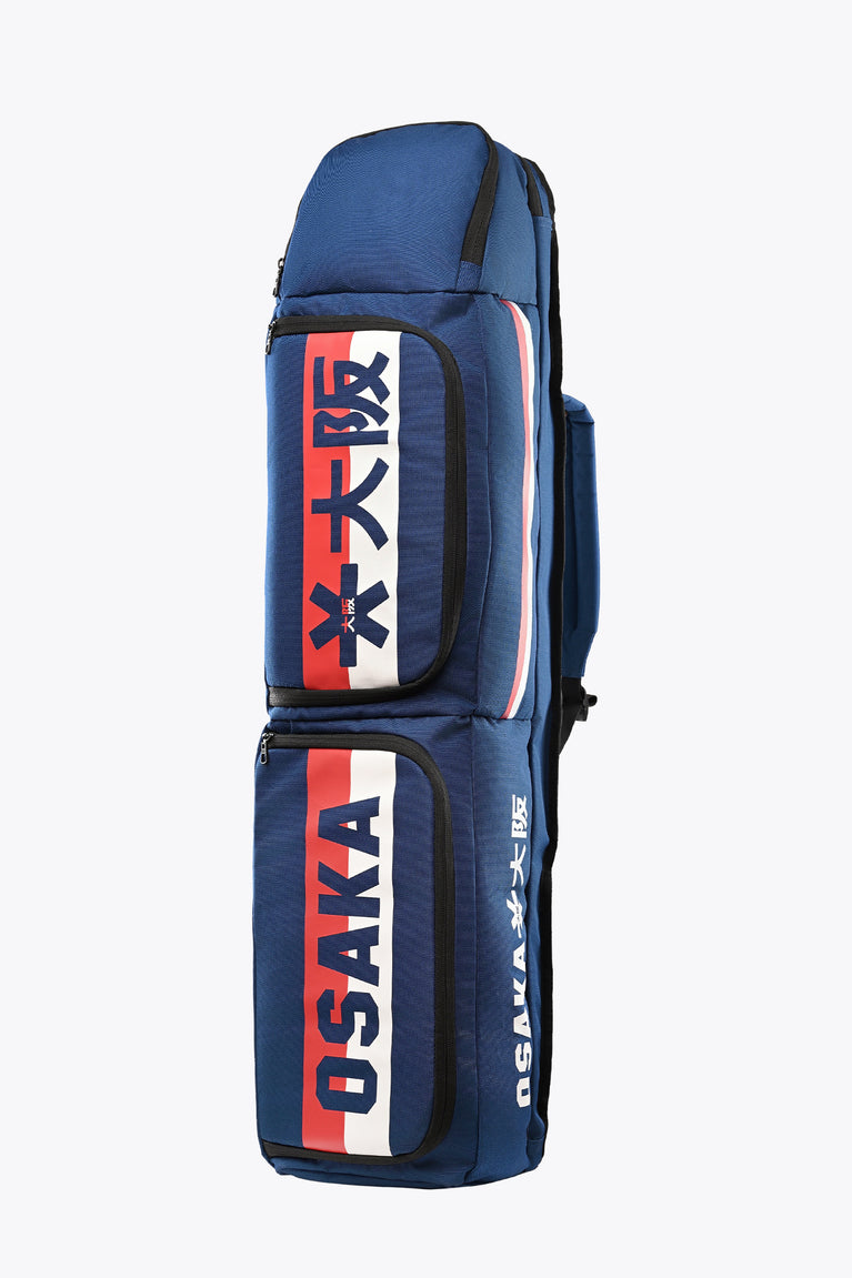 Blue large stick bag with red Osaka branding, front pockets, and carry handle