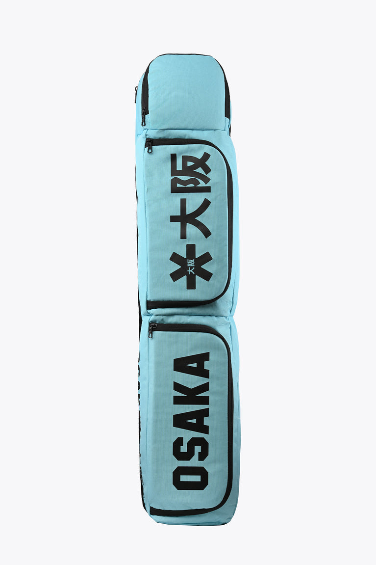 Medium sports stickbag in Blue Topaz, vertical Osaka logo panel and carry handle